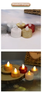 Close-up of glitter LED tea light candles in gold, silver, and red for romantic decor