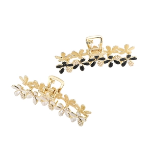 Elegant floral hair claw clips with pearls and enamel in black and white styles