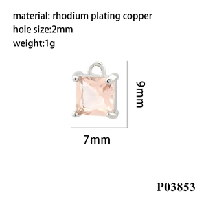 Macro detail of 9x7mm pink cubic zirconia pendant with rhodium plating copper specs