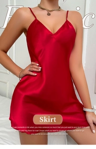 Detail shot of the red satin slip dress showing the smooth texture and elegant V-neckline