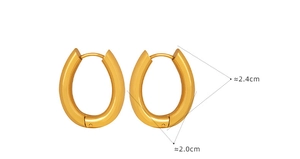 Macro view of gold U-shaped earrings showing dimensions of 2.4cm in height and 2.0cm width