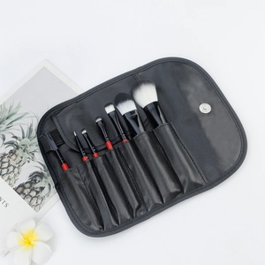 7-piece redwood handle makeup brush set with black leather storage pouch and powder brush