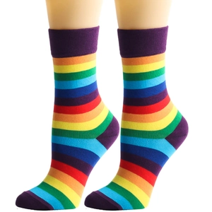 Detail of colorful rainbow striped crew socks with reinforced purple toe and heel