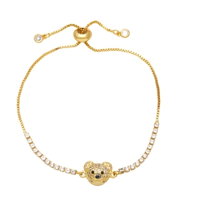 Bracelet doré avec pendentif ours en zircons cubiques et chaîne réglable à glissière