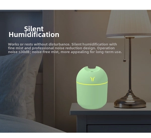 Detail showing the green capsule humidifier with silent 30dB misting on bedside table