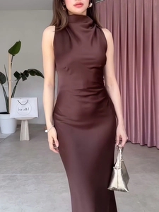 Elegant sleeveless brown satin maxi dress with a high neckline and slim-fit silhouette