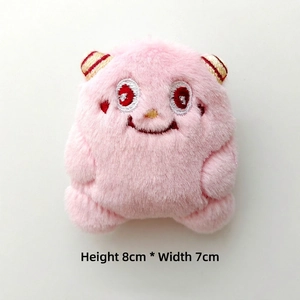 Pink cartoon plush monster keychain with 8cm height and 7cm width dimensions