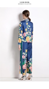 Detail of floral print satin two-piece set with long sleeve shirt and wide-leg trousers