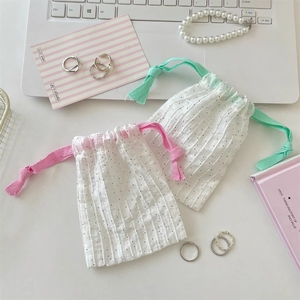 Chic drawstring storage bags in polka dot pattern for jewelry and daily accessories