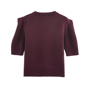 Women's burgundy knit short sleeve top with round neck and trendy puff shoulder design