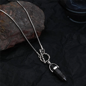 Silver snake chain necklace with black quartz hexagonal pendant for men on dark background