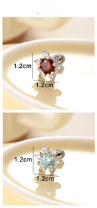 Detail view of 1.2cm heart snowflake titanium steel stud earrings with cubic zirconia