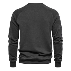 Back view of dark gray crewneck sweatshirt with raglan sleeves in a relaxed fit