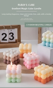 Close-up of stylish gradient bubble cube candles with various pastel color fades