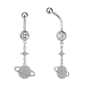 Detailed view of silver zircon belly ring featuring a star and planet pendant on white background