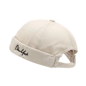 Beige cotton docker cap with New York embroidery and adjustable strap in street style