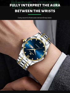 Detail of blue sunray dial with Roman numerals and dual calendar on steel watch