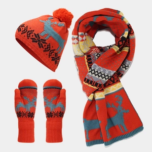 Winter knit set with red Christmas elk pattern including pompom hat, scarf, and gloves