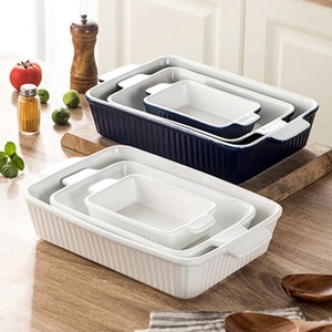 Nesting rectangular ceramic baking pans with vertical stripes and dual handles set of three