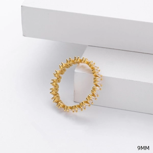 Macro shot of 9mm wide gold V-ring featuring rectangular white zircon stones on white stand