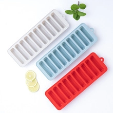 Three colorful silicone ice molds with lemon and mint on a clean white background
