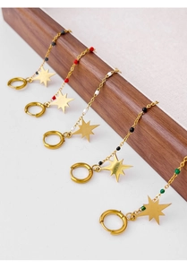Detailed view of bohemian gold star earrings set with colorful beads in five vibrant colors