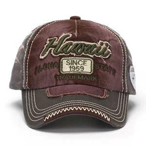 Washed denim baseball cap with Hawaii embroidery and vintage distressed finish