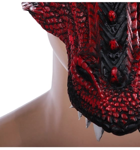 Detail of red and black dragon mask with sharp white teeth and 3D lifelike scale texture