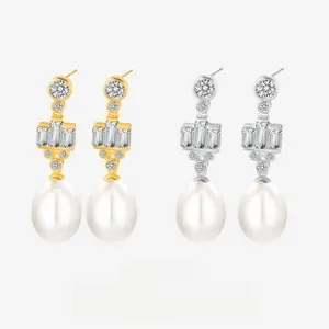 Macro detail of 925 sterling silver teardrop pearl earrings with zircon inlay