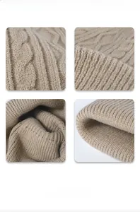 Macro view of khaki chunky cable knit texture and ribbed cuff detail on warm beanie