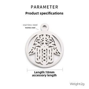Detail of 18mm stainless steel Hamsa hand pendant showing hollow circular charm design