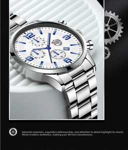 Detail of silver stainless steel watch strap and white dial with blue Roman numerals