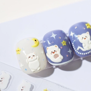 3D embossed nail stickers featuring cute white cat bear moon and star designs