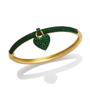 Elegant gold bangle with heart charm featuring pave emerald green cubic zirconia