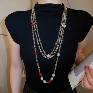 Three-layer vintage gold chain necklace with red and pink beaded tiger eye stones