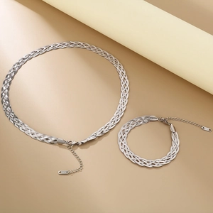 Detail of silver stainless steel woven mesh necklace and bracelet set with lobster clasp