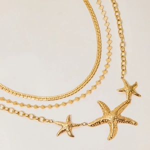 Mehrlagige goldene Edelstahlkette mit Seestern-Anhänger und verschiedenen Kettendesigns
