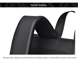 Detail of ergonomic padded mesh shoulder straps on the black commuter backpack