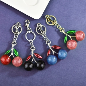 Sparkling cherry keychains in red, black, blue and pink with glitter resin and metal clasp