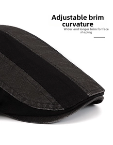 Detail of the foldable brim and textured fabric on this men's vintage washed cotton flat cap