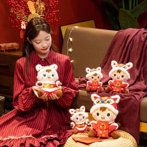 Festive zodiac horse plush toy mascot wearing a lion dance hat and traditional Tang suit