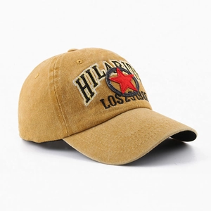 Washed cotton baseball cap in mustard yellow with vintage Hilarious embroidery