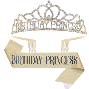 Detail of gold glitter Birthday Princess sash and sparkling rhinestone tiara set