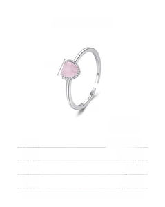 Detail of S925 sterling silver ring featuring a pink heart stone and sizing specifications