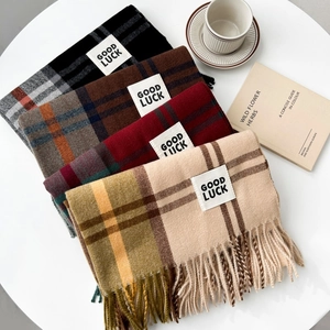 Winter plaid tassel scarf in black, brown, wine red and beige colors with a soft texture
