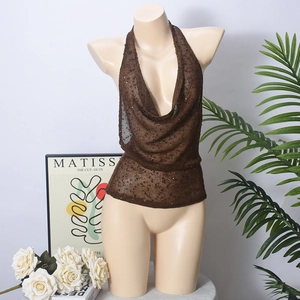 Detail of dark brown sequin halter neck top with knit texture on a mannequin