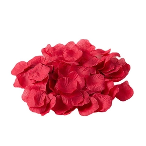 Vibrant red artificial rose petals made of non-woven fabric for wedding decoration