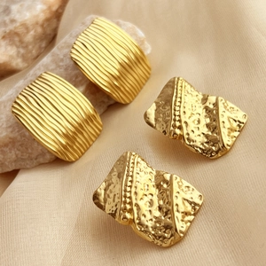 Exaggerated geometric 18K gold-plated stainless steel earrings with textured patterns