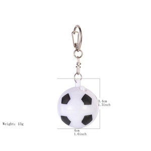 Detailed view of soccer ball keychain with silver spring clasp and 4cm diameter size specs