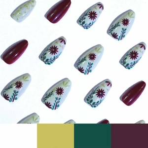 Almond press-on nails with red floral patterns and glossy burgundy finish on white base